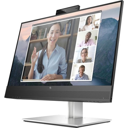 HP Monitor showing the image of a video-conference of 5 people, including 3 women and 2 men. The monitor also has a camera on the top center.