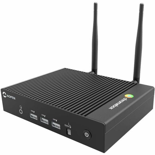 Black computer router with antennas on a white background
