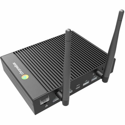 Black router with antennas on a white background