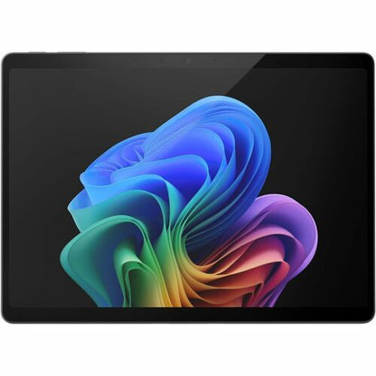Tablet with a colorful abstract design on the screen against a black background