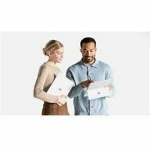 Two people holding a white box against a white background