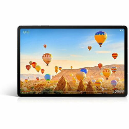 Tablet displaying a scenic wallpaper with hot air balloons and mountains.