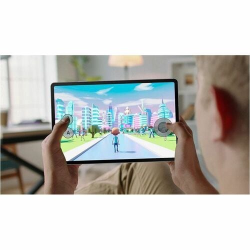 Person playing a game on a tablet with a colorful cityscape on the screen