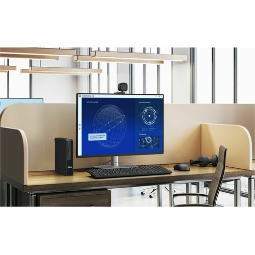 Computer setup on a desk with a monitor, keyboard, and mouse in an office environment.